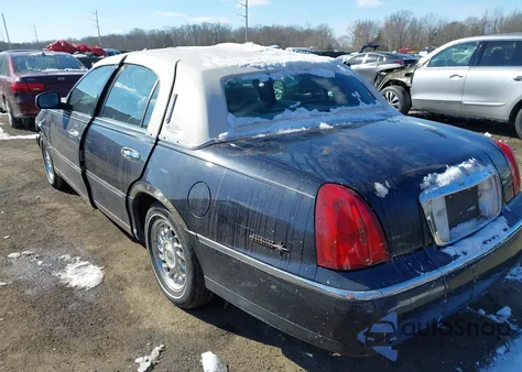 2000 Lincoln Town Car Executive из США, поврежденный, VIN 1LNHM81W7YY797025